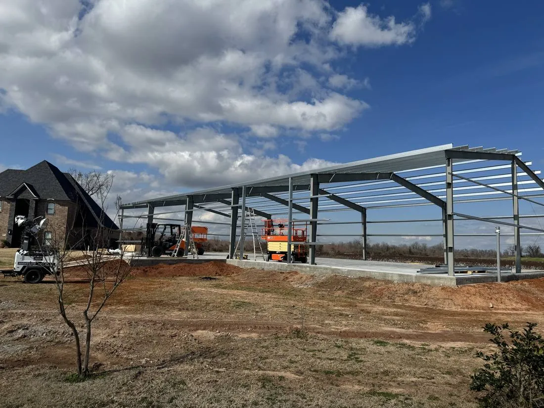 Steel frame shop building under construction by J2 Construction
